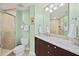 Bright bathroom featuring granite countertops and a glass shower at 2515 S Atlantic Ave # 401, Daytona Beach Shores, FL 32118