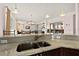 Modern kitchen with stainless steel sink, granite countertops, and an open concept design at 2515 S Atlantic Ave # 401, Daytona Beach Shores, FL 32118