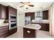 Kitchen featuring granite countertops and stainless steel appliances at 2515 S Atlantic Ave # 401, Daytona Beach Shores, FL 32118