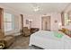 Airy main bedroom with a cozy sitting area, large window, and beautiful interior decor at 2515 S Atlantic Ave # 401, Daytona Beach Shores, FL 32118