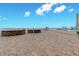Expansive outdoor deck with stone fire pits, lounge chairs, and ocean views at 2515 S Atlantic Ave # 401, Daytona Beach Shores, FL 32118