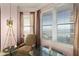 Cozy sitting area with views of the ocean with an eclectic mix of furniture at 2515 S Atlantic Ave # 401, Daytona Beach Shores, FL 32118