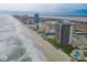 Expansive aerial shot of beachfront condominiums lining the coast in Daytona Beach Shores, Florida at 2555 S Atlantic Ave # 1007, Daytona Beach Shores, FL 32118