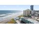 Breathtaking aerial view of oceanfront condo with a pool steps from the beach at 2555 S Atlantic Ave # 1007, Daytona Beach Shores, FL 32118