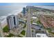 Wide aerial perspective of Daytona Beach Shores featuring modern beachfront condos and a lively coastal community at 2555 S Atlantic Ave # 1007, Daytona Beach Shores, FL 32118
