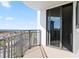 Balcony with metal railings offering city and ocean views, accessible via sliding glass door at 2555 S Atlantic Ave # 1007, Daytona Beach Shores, FL 32118
