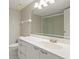 Well-lit bathroom with a glass enclosed shower and a single sink vanity with great lighting at 2555 S Atlantic Ave # 1007, Daytona Beach Shores, FL 32118