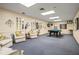 Spacious game room featuring a pool table, comfortable seating, and stylish decor at 2555 S Atlantic Ave # 1007, Daytona Beach Shores, FL 32118
