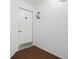 Neutral hallway with a door and carpeting for added warmth at 2555 S Atlantic Ave # 1007, Daytona Beach Shores, FL 32118