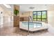 Relaxing indoor hot tub with tile surround, offering a tranquil escape year-round at 2555 S Atlantic Ave # 1007, Daytona Beach Shores, FL 32118