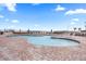 Stunning outdoor pool area with ample seating for relaxation and enjoying the sunshine at 2555 S Atlantic Ave # 1007, Daytona Beach Shores, FL 32118