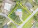 Captivating aerial view of the property featuring a backyard pool, showcasing lot size, layout, and neighborhood at 2557 Shiprock Ct, Deltona, FL 32738