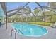 Screened-in pool area offers ample space for seating and enjoying outdoor relaxation at 2557 Shiprock Ct, Deltona, FL 32738
