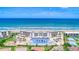 Aerial view showcasing the beachfront condo community with beach access and ocean views at 2700 Ocean Shore Blvd # 305, Ormond Beach, FL 32176