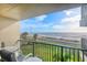 Enjoy ocean views from this condo balcony with seating, overlooking the beach and community at 2700 Ocean Shore Blvd # 305, Ormond Beach, FL 32176