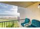 Breathtaking ocean views from this condo balcony with seating, capturing the essence of coastal living at 2700 Ocean Shore Blvd # 305, Ormond Beach, FL 32176
