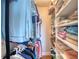 Well-organized walk-in closet with shelving and ample storage space for clothes and accessories at 2700 Ocean Shore Blvd # 305, Ormond Beach, FL 32176