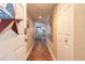 Entryway that opens to a dining and living space, boasting wood floors and neutral walls at 2967 S Atlantic Ave # 604, Daytona Beach, FL 32118