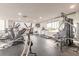 Large fitness center with modern exercise machines and floor-to-ceiling windows at 2967 S Atlantic Ave # 604, Daytona Beach, FL 32118