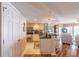 Galley kitchen features stainless appliances, counter seating, and views of the living area at 2967 S Atlantic Ave # 604, Daytona Beach, FL 32118