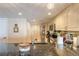 Kitchen with dark counters, ample storage, and stainless appliances at 2967 S Atlantic Ave # 604, Daytona Beach, FL 32118