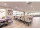 Spacious meeting room for social events, features ample tables and seating at 2967 S Atlantic Ave # 604, Daytona Beach, FL 32118