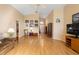 Open living room with high ceilings, hardwood floors, and a relaxing atmosphere at 3021 Little Cypress Cv, Winter Park, FL 32792