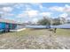Large, fenced backyard with a playset, perfect for outdoor activities at 3057 Norlina St, Deltona, FL 32738