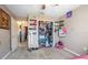 Cozy bedroom with carpet, closet, shelving and natural light at 3057 Norlina St, Deltona, FL 32738