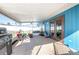 Spacious screened patio with tile flooring, perfect for relaxing or entertaining at 3057 Norlina St, Deltona, FL 32738