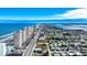 Stunning aerial view of oceanfront condos and the scenic coastline at 3315 S Atlantic Ave # 705, Daytona Beach, FL 32118