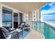 Balcony with a seating area and great views of the ocean and beach at 3315 S Atlantic Ave # 705, Daytona Beach, FL 32118