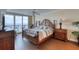 A spacious bedroom with a water view, coastal decor, and neutral tones throughout at 3315 S Atlantic Ave # 705, Daytona Beach, FL 32118