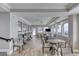 Bright dining area with wood floors and expansive windows overlooking the ocean view at 3315 S Atlantic Ave # 705, Daytona Beach, FL 32118