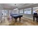 Spacious game room featuring a pool table and ocean views at 3315 S Atlantic Ave # 705, Daytona Beach, FL 32118