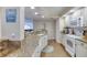 Updated kitchen with granite countertops, white appliances, and a convenient breakfast bar at 3315 S Atlantic Ave # 705, Daytona Beach, FL 32118