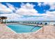 Relaxing outdoor pool with lounge chairs overlooking the ocean and beach at 3315 S Atlantic Ave # 705, Daytona Beach, FL 32118