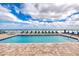 Resort-style pool featuring plenty of lounge seating and ocean views at 3315 S Atlantic Ave # 705, Daytona Beach, FL 32118