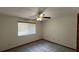 Bedroom featuring a ceiling fan, neutral wall color, and carpeted floors at 3550 Forest Branch Dr # A, Port Orange, FL 32129