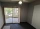 Bedroom featuring a ceiling fan, neutral wall color, and carpeted floors at 3550 Forest Branch Dr # A, Port Orange, FL 32129