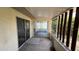 Covered patio with screened windows and sliding glass doors at 3550 Forest Branch Dr # A, Port Orange, FL 32129