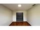 Sunlit room featuring hardwood floors and a modern recessed lighting fixture perfect for dining or entertaining at 3550 Forest Branch Dr # A, Port Orange, FL 32129