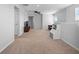 Bright and airy living room features neutral carpet, ceiling fan, and lots of light at 3565 Fernanda Dr, Deltona, FL 32738