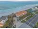 Expansive beachfront home with an inviting walkway to the sandy beach, offering the perfect coastal lifestyle at 4626 Harbour Village Blvd # 3302, Ponce Inlet, FL 32127