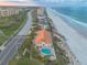 Expansive oceanfront home boasts a private pool and beach access, perfect for luxurious coastal living at 4626 Harbour Village Blvd # 3302, Ponce Inlet, FL 32127