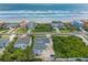 Aerial view of coastal real estate with ocean views and scenic landscaping at 4734 S Atlantic Ave, Ponce Inlet, FL 32127
