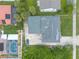 Aerial view of the property shows its roof condition and proximity to nearby homes and a swimming pool at 4734 S Atlantic Ave, Ponce Inlet, FL 32127