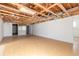 Unfinished basement with exposed ceiling, open layout, and natural light at 4734 S Atlantic Ave, Ponce Inlet, FL 32127