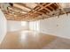 Unfinished basement with exposed ceiling, open layout, and natural light at 4734 S Atlantic Ave, Ponce Inlet, FL 32127