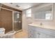 Updated bathroom with tiled shower, sleek vanity, and bright natural light at 4734 S Atlantic Ave, Ponce Inlet, FL 32127